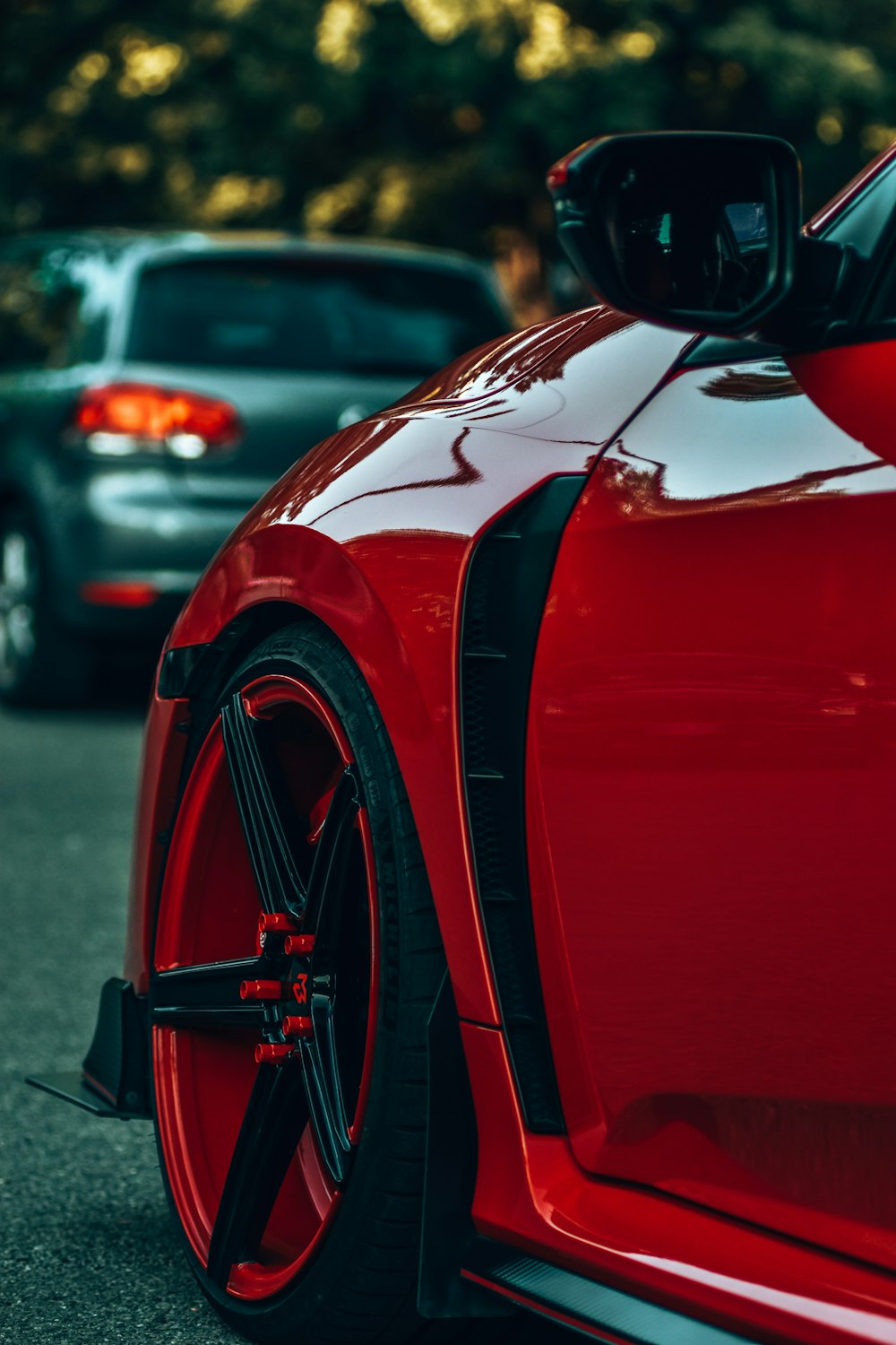 a red car with a black rim