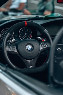 a steering wheel and dashboard of a car