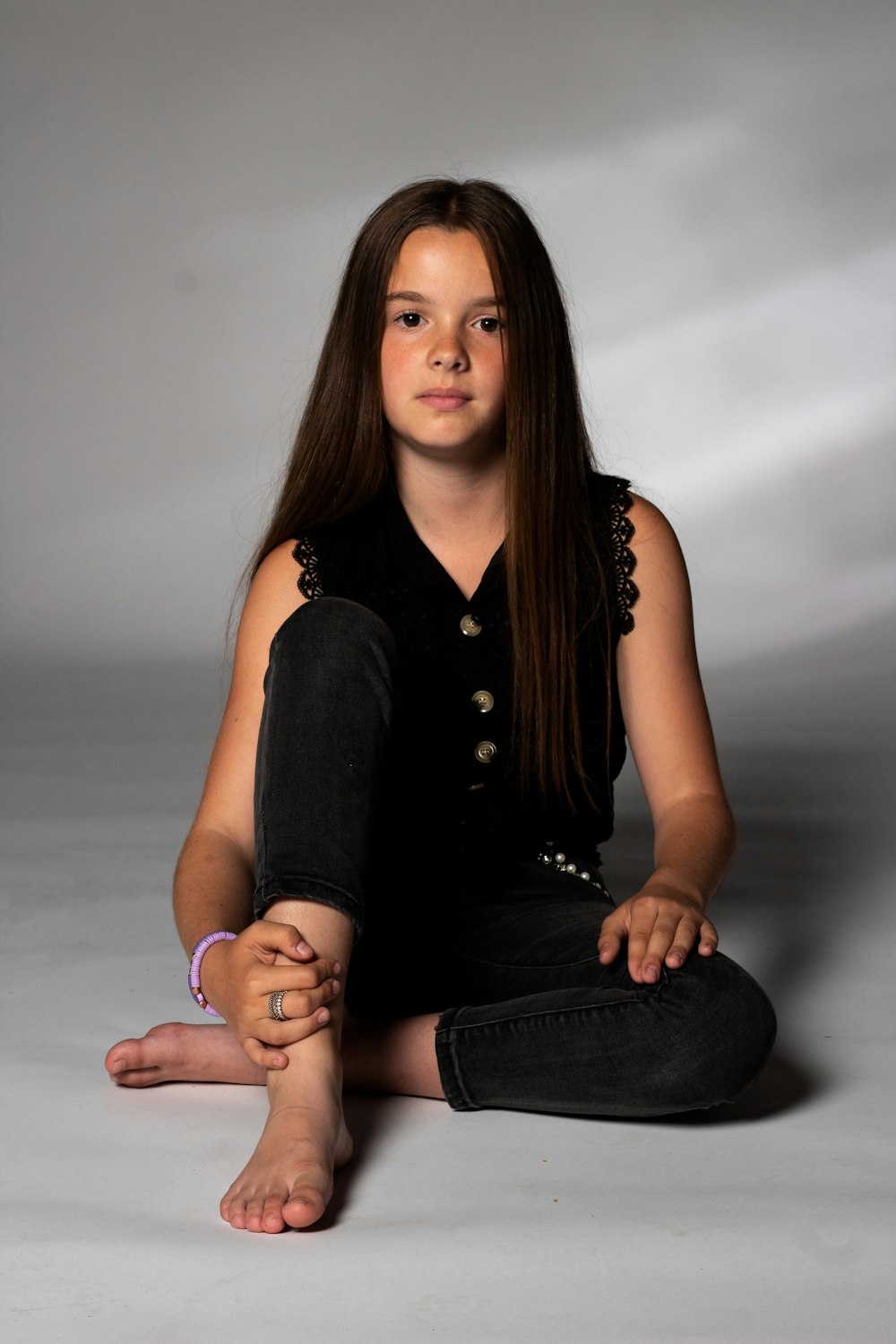 a woman sitting on the floor