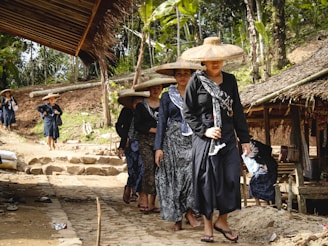 a group of women wearing hats