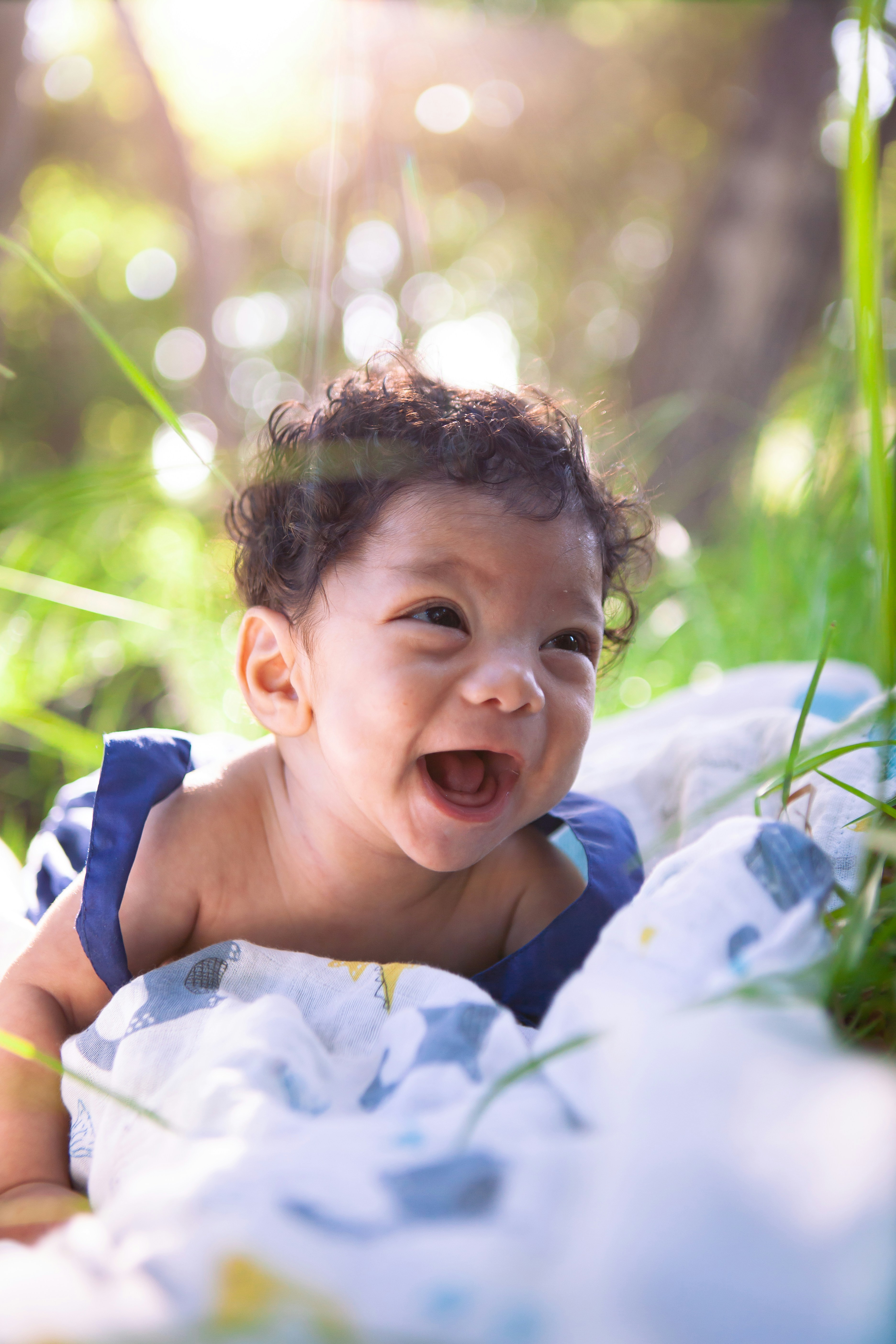 a child lying in the grass