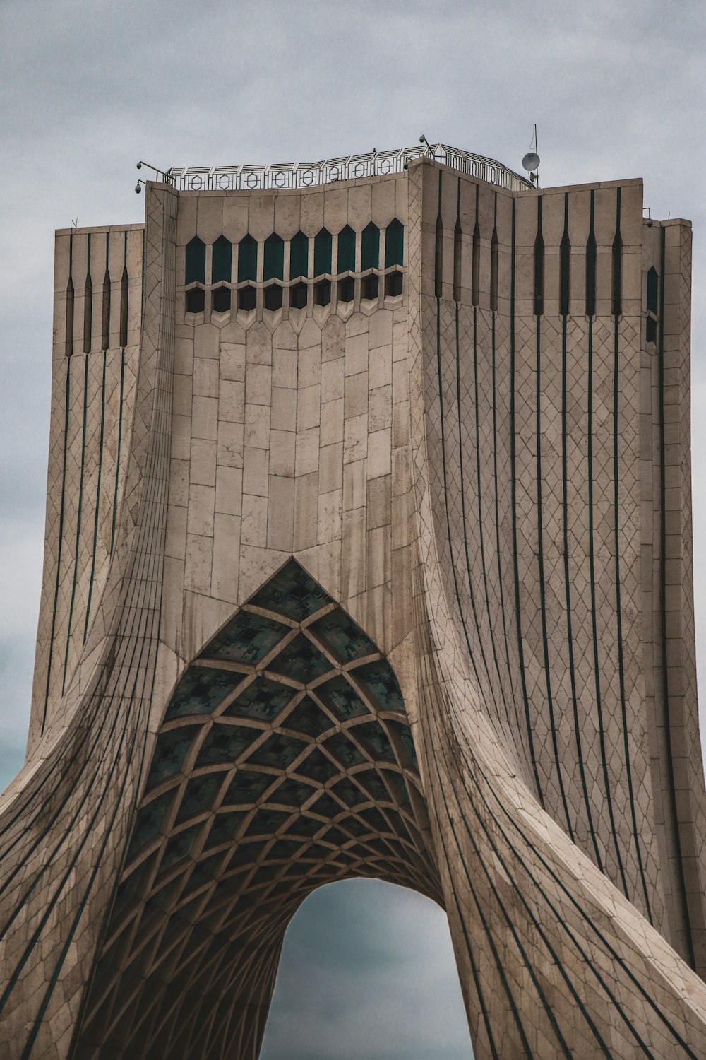 a tall tower with a bridge