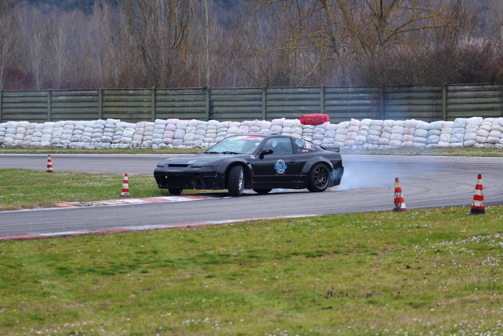 a black car on a race track