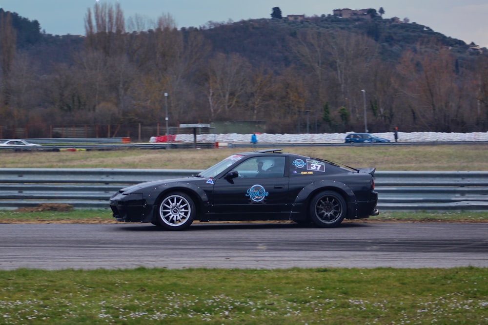 a black car on a race track