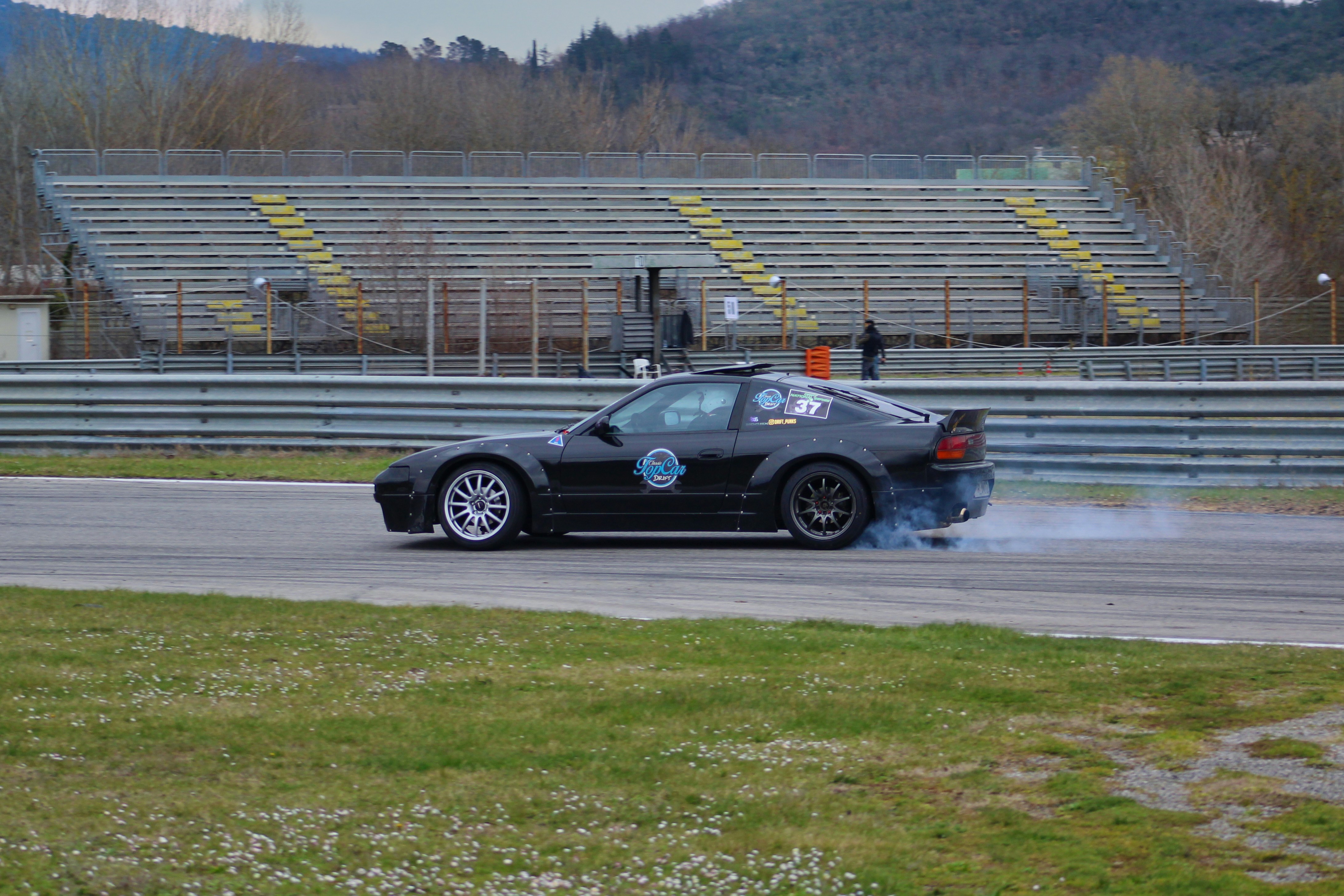 a black car on a race track