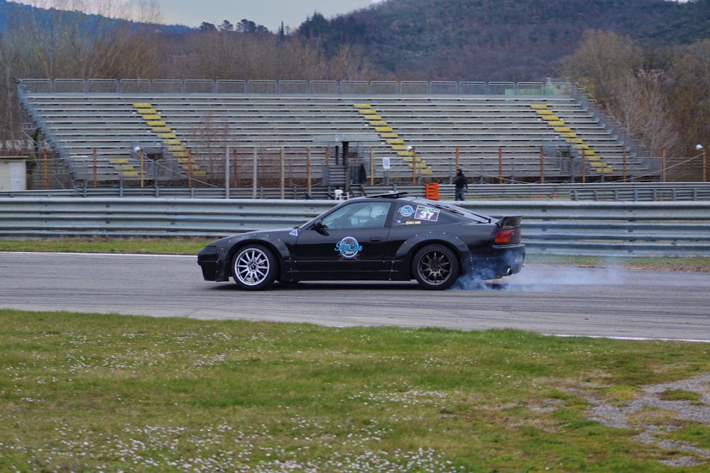 a black car on a race track