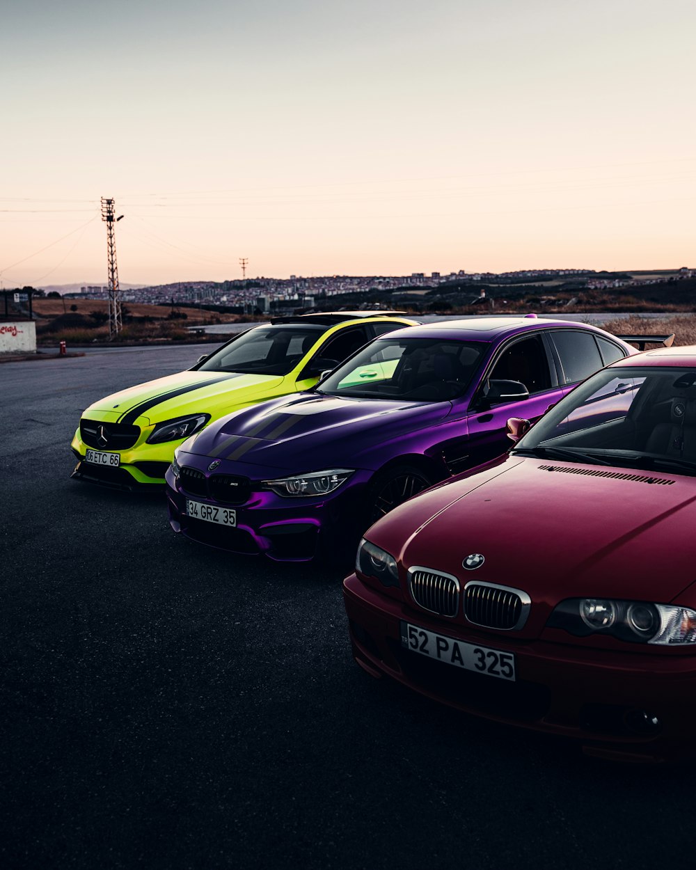 a group of cars parked in a parking lot