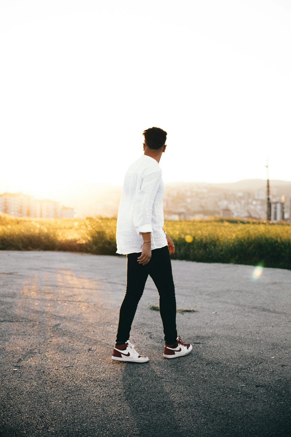 a man standing on a road