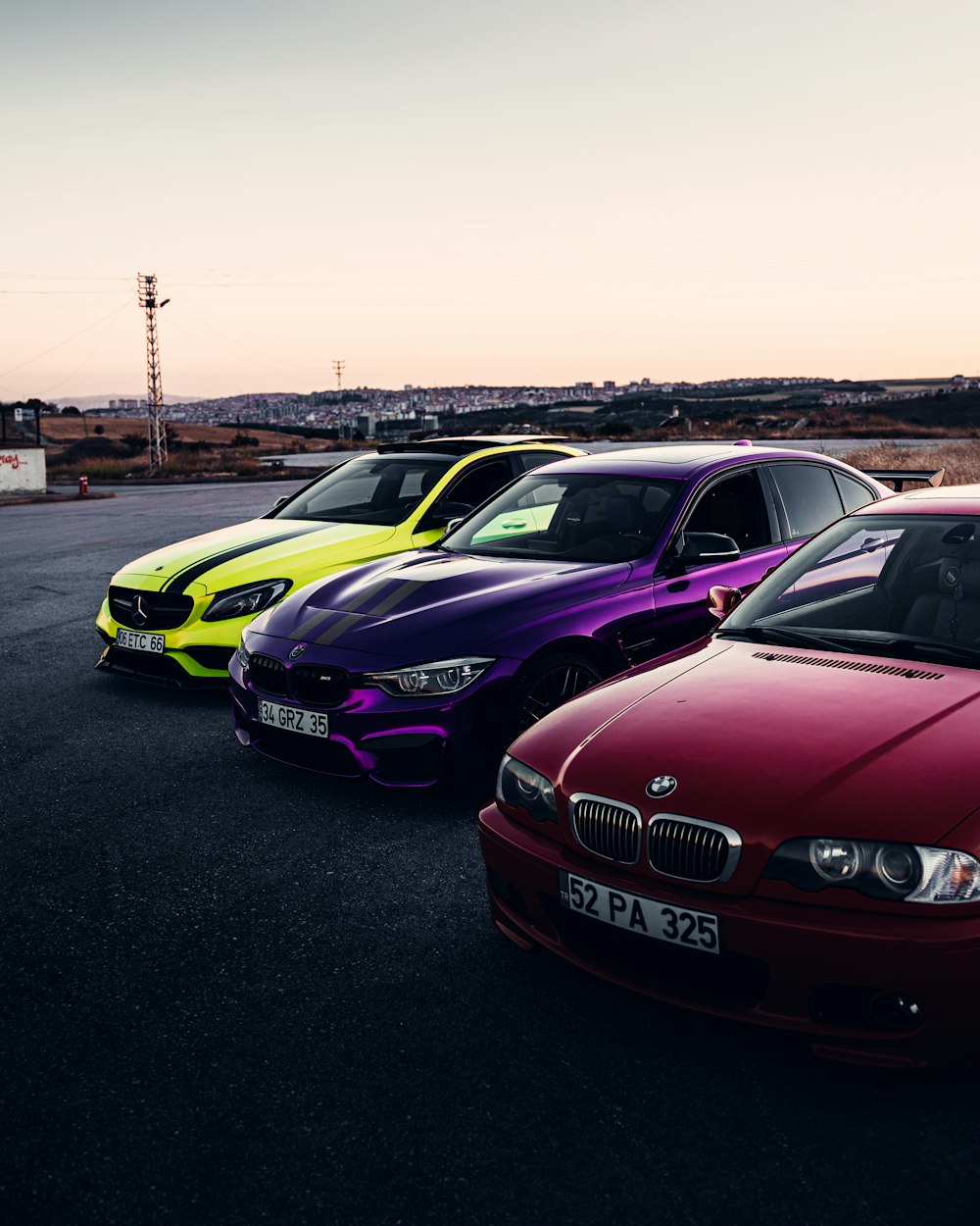 a group of cars parked in a parking lot