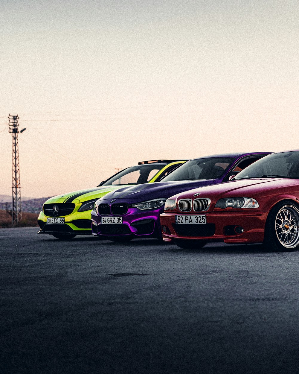 a group of cars parked in a parking lot