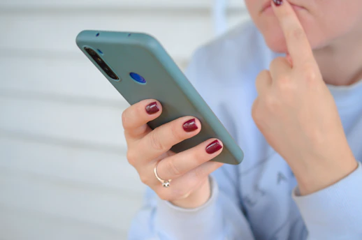 a person holding a cell phone