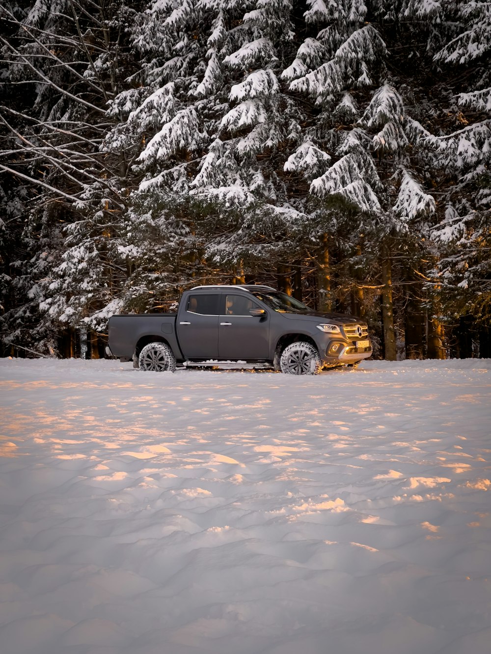 a truck parked in the snow