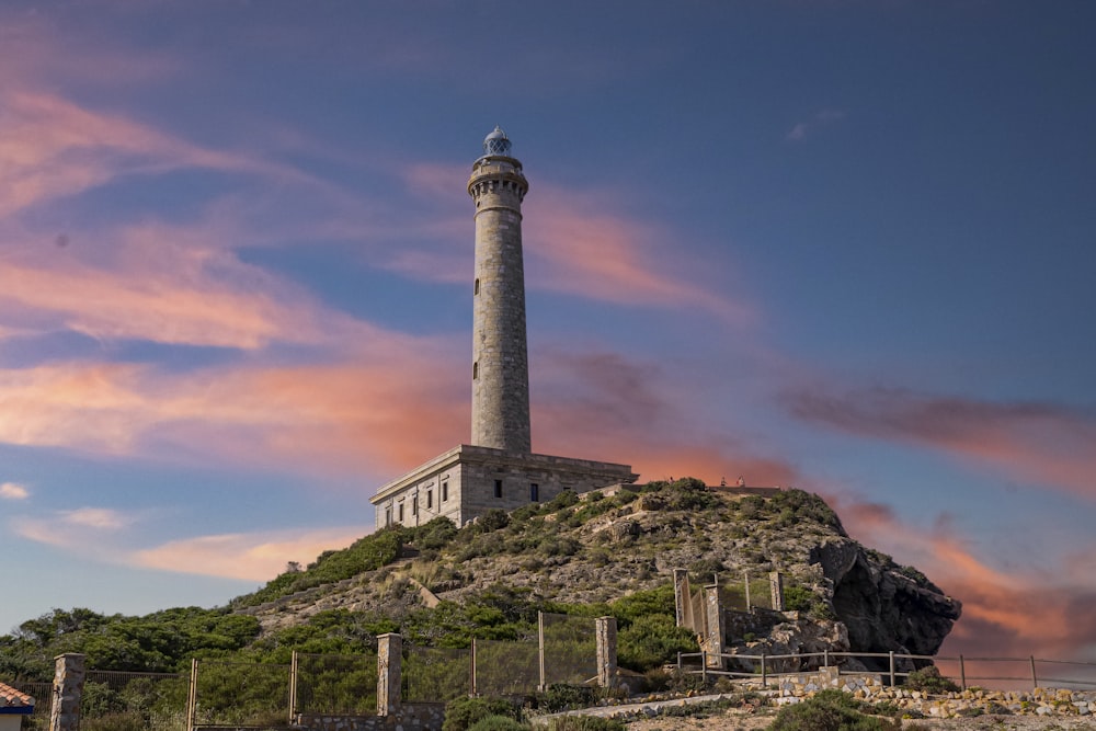 a stone tower on a hill