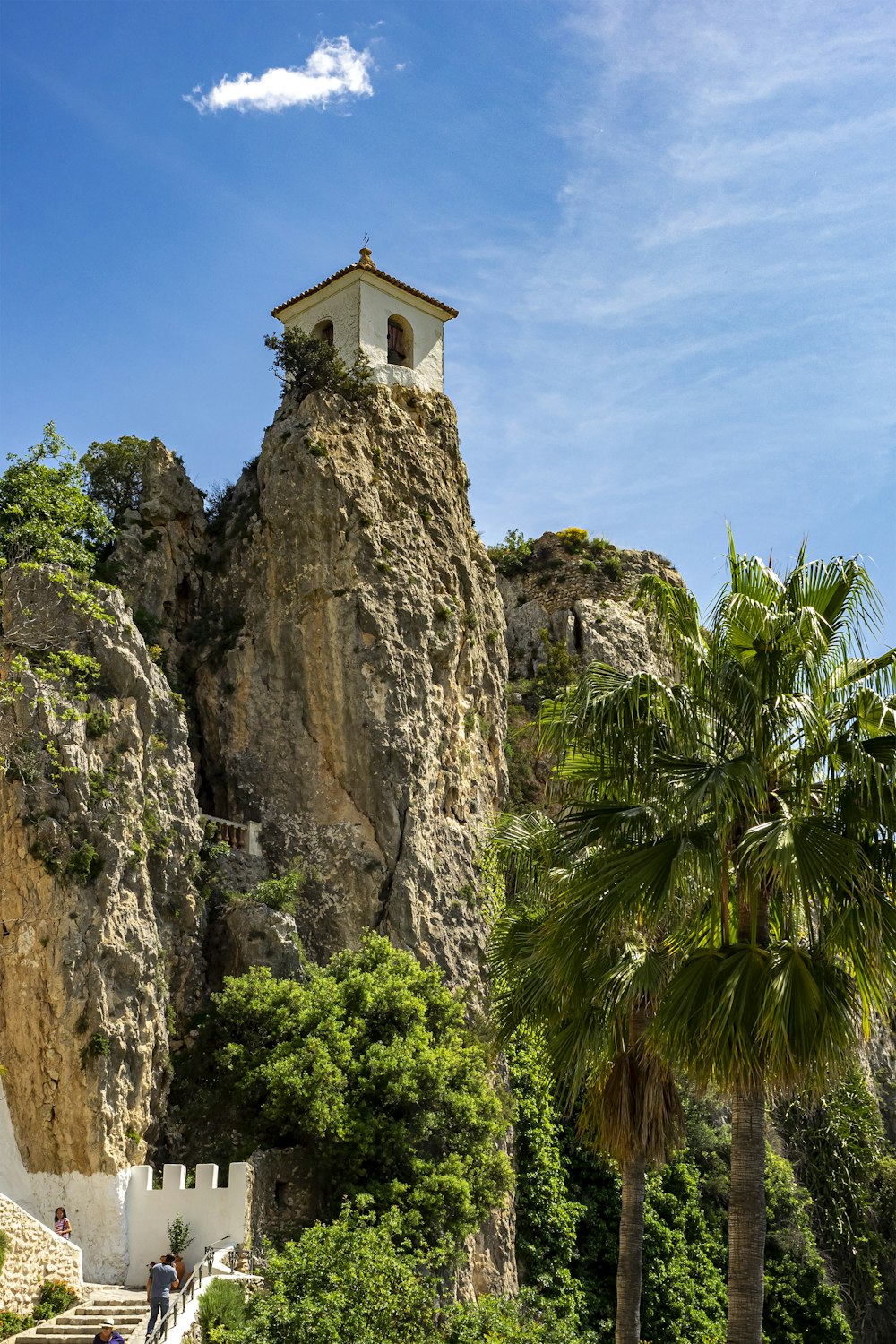 a building on a rock