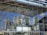A clean glass facade reflecting sunlight in an urban setting.