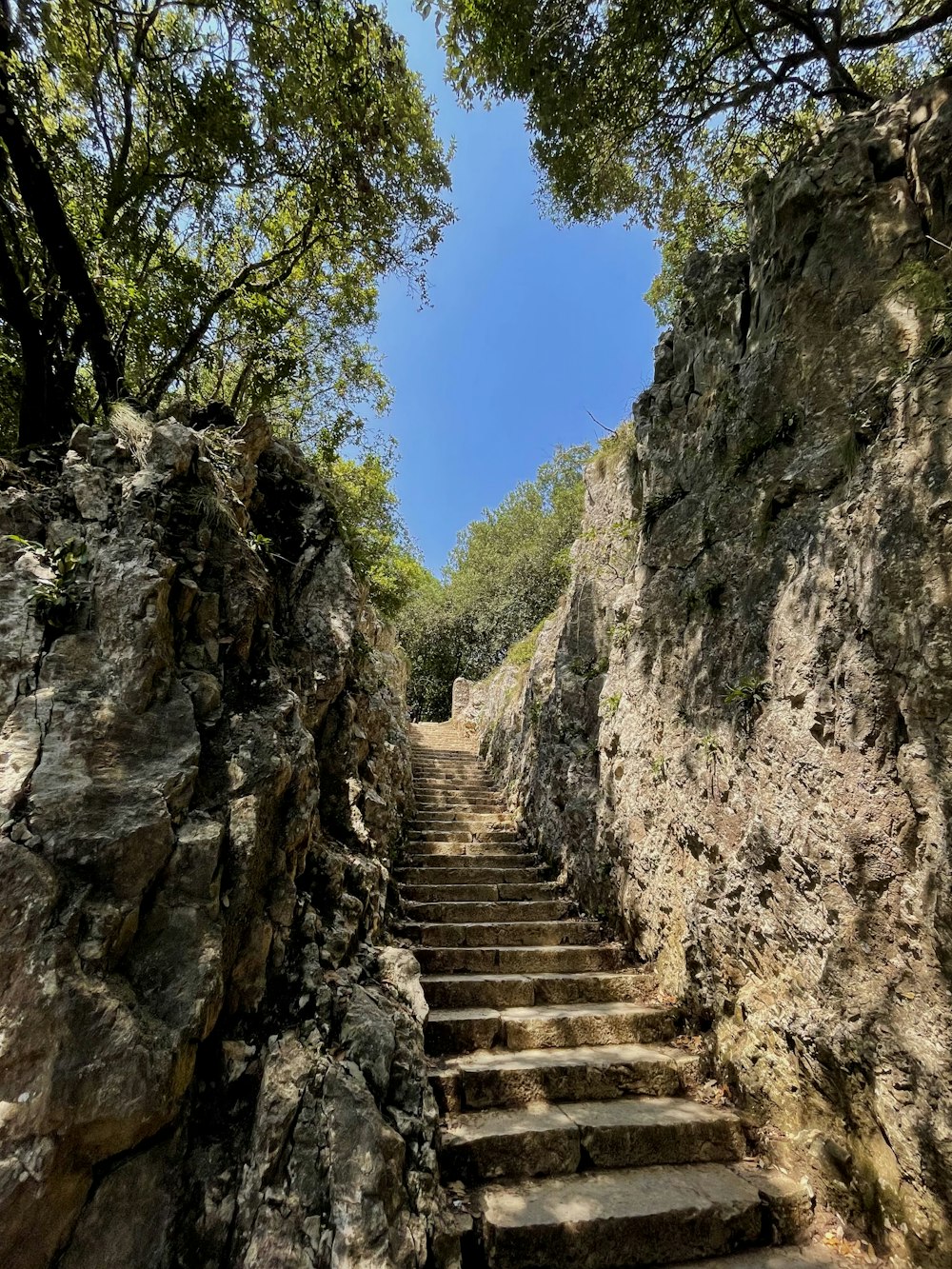 a stone staircase on a cliff