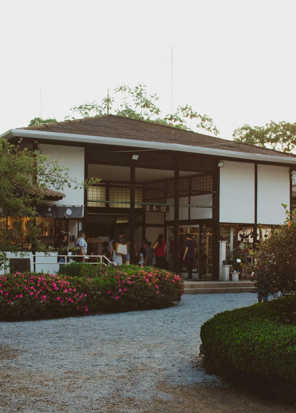 a building with a pond in front of it