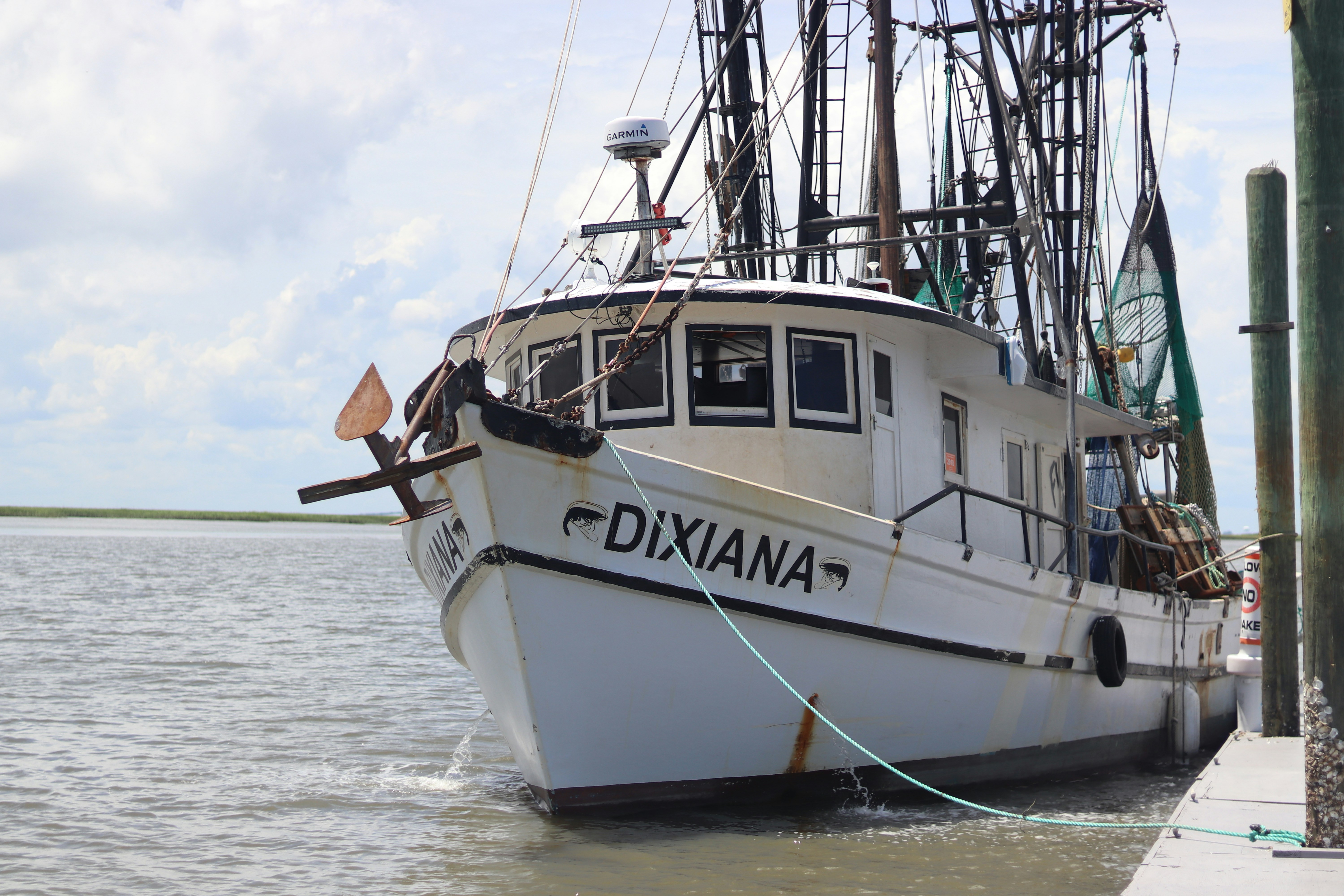 a boat tied to a dock