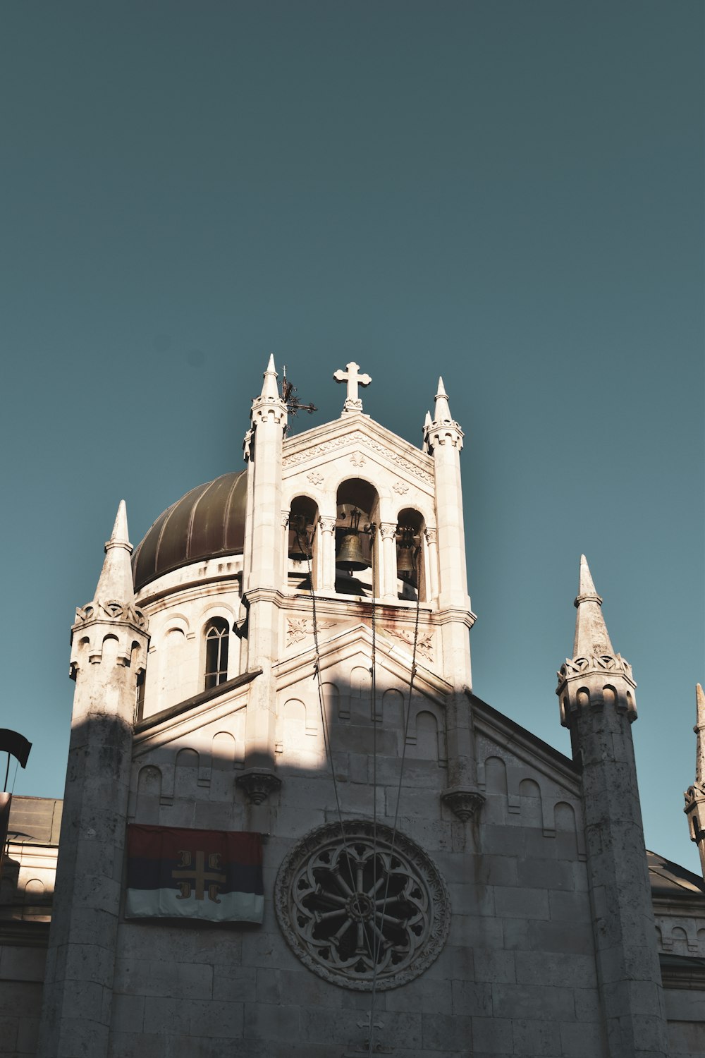 a large white building with a clock on it