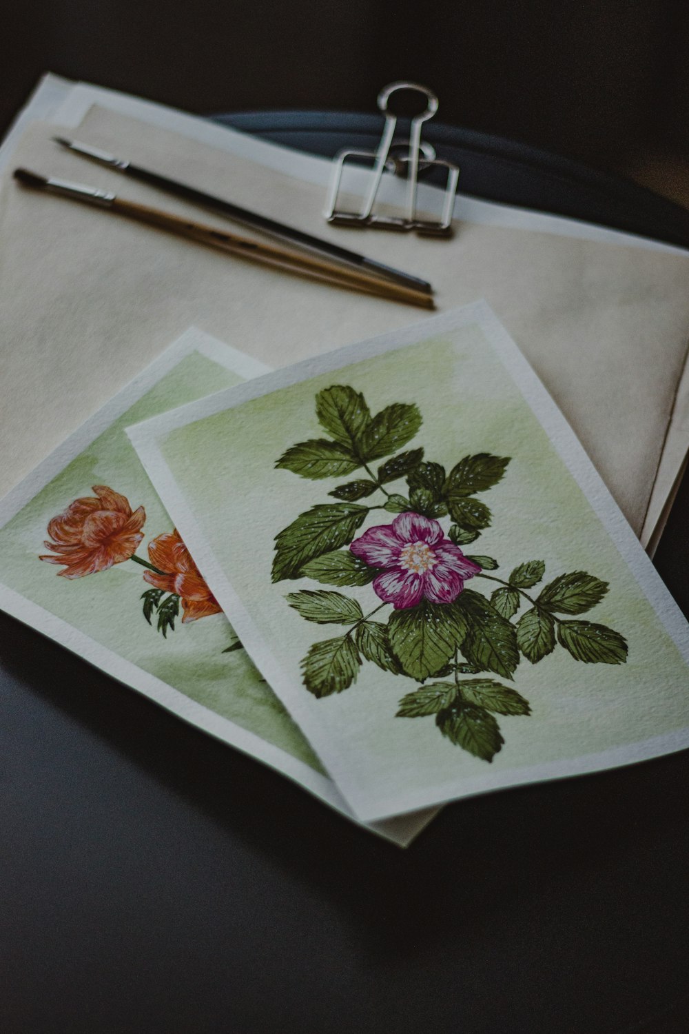 a book and a pen on a table