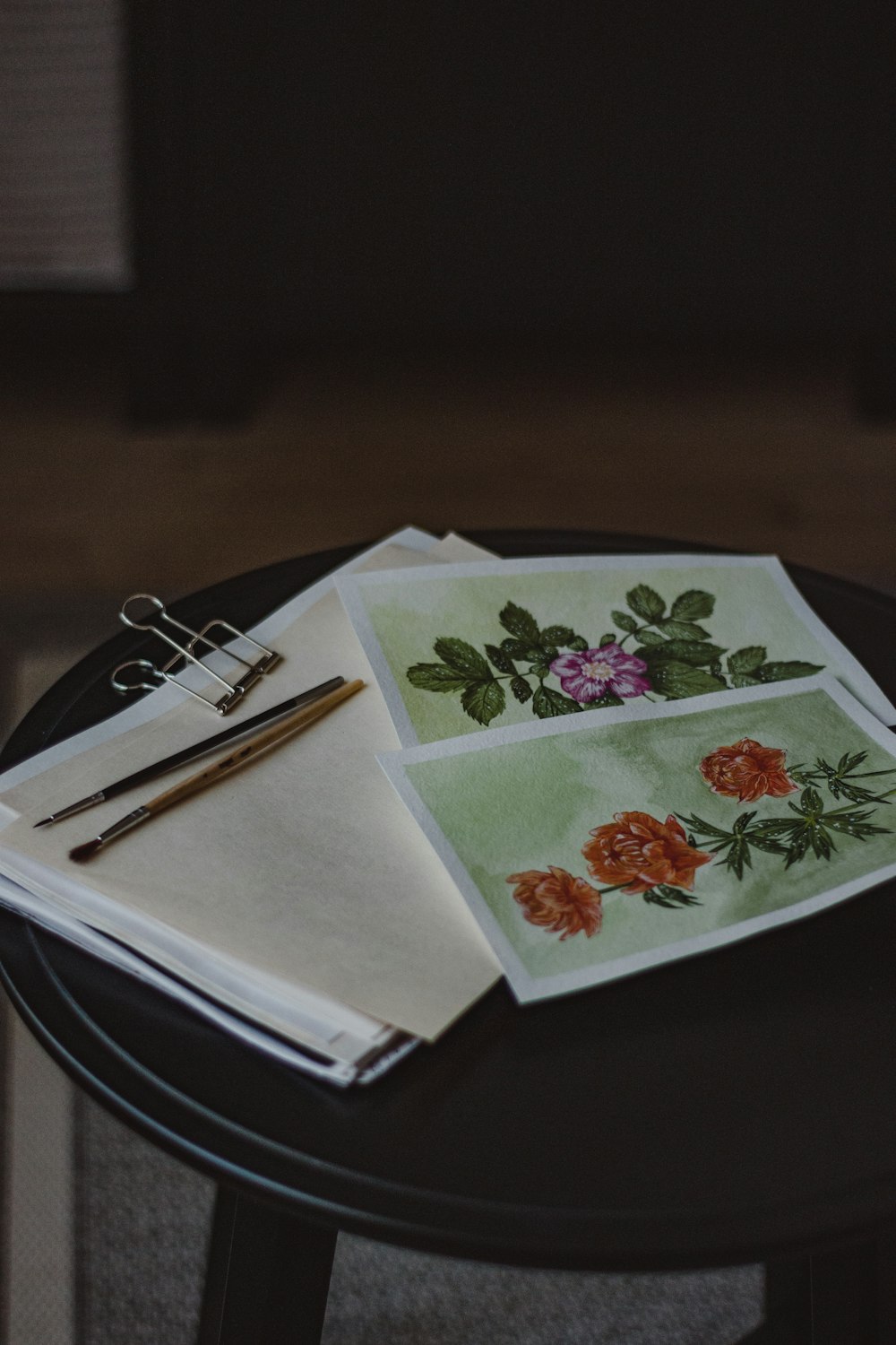 a book and glasses on a table