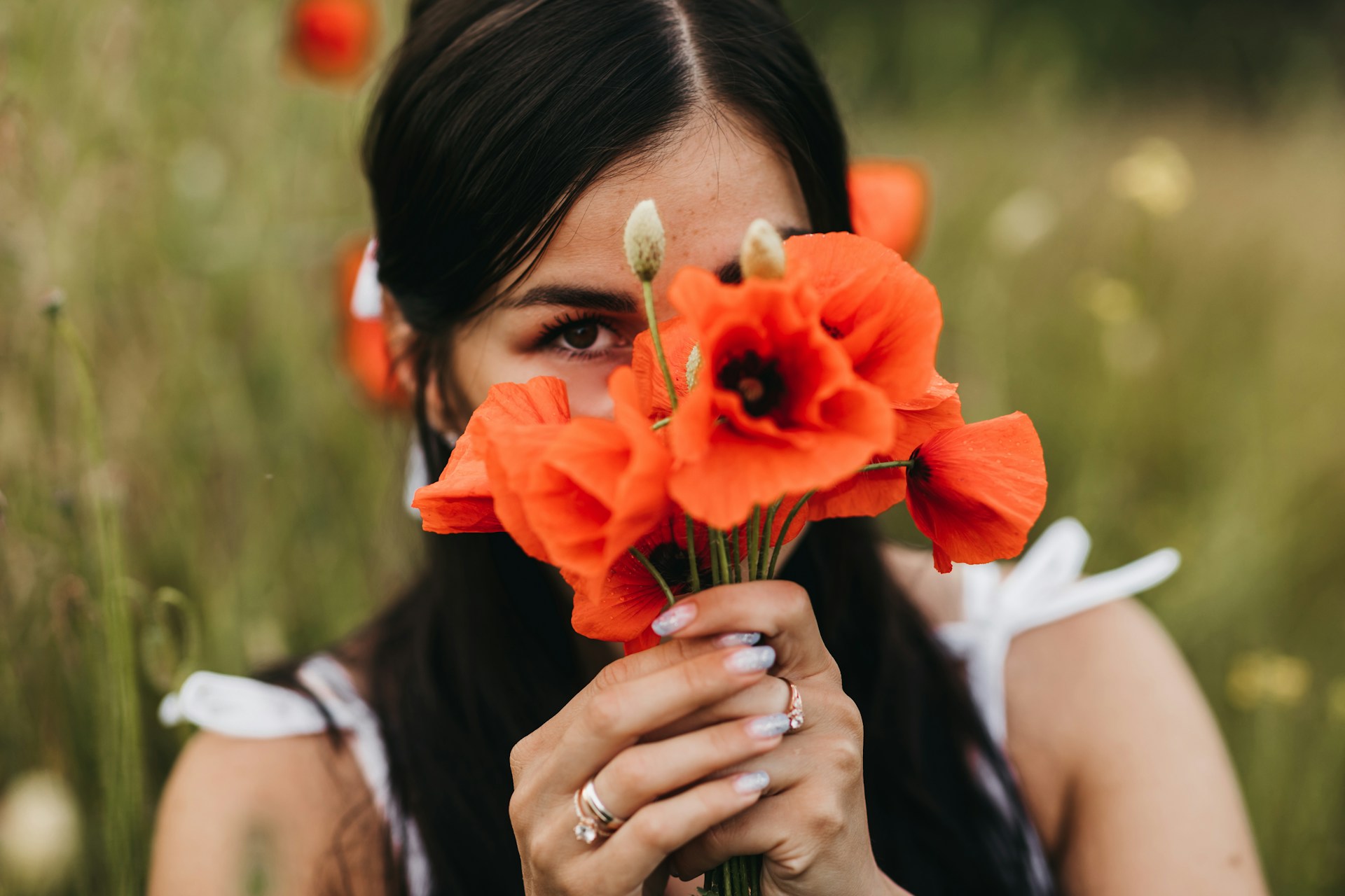 a woman holding flowers