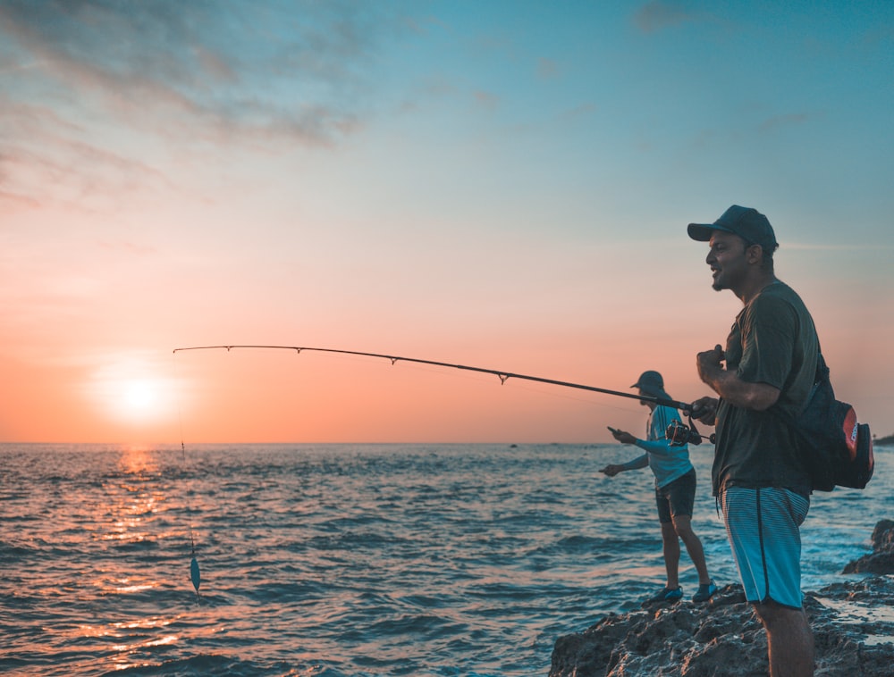 a man and a woman fishing