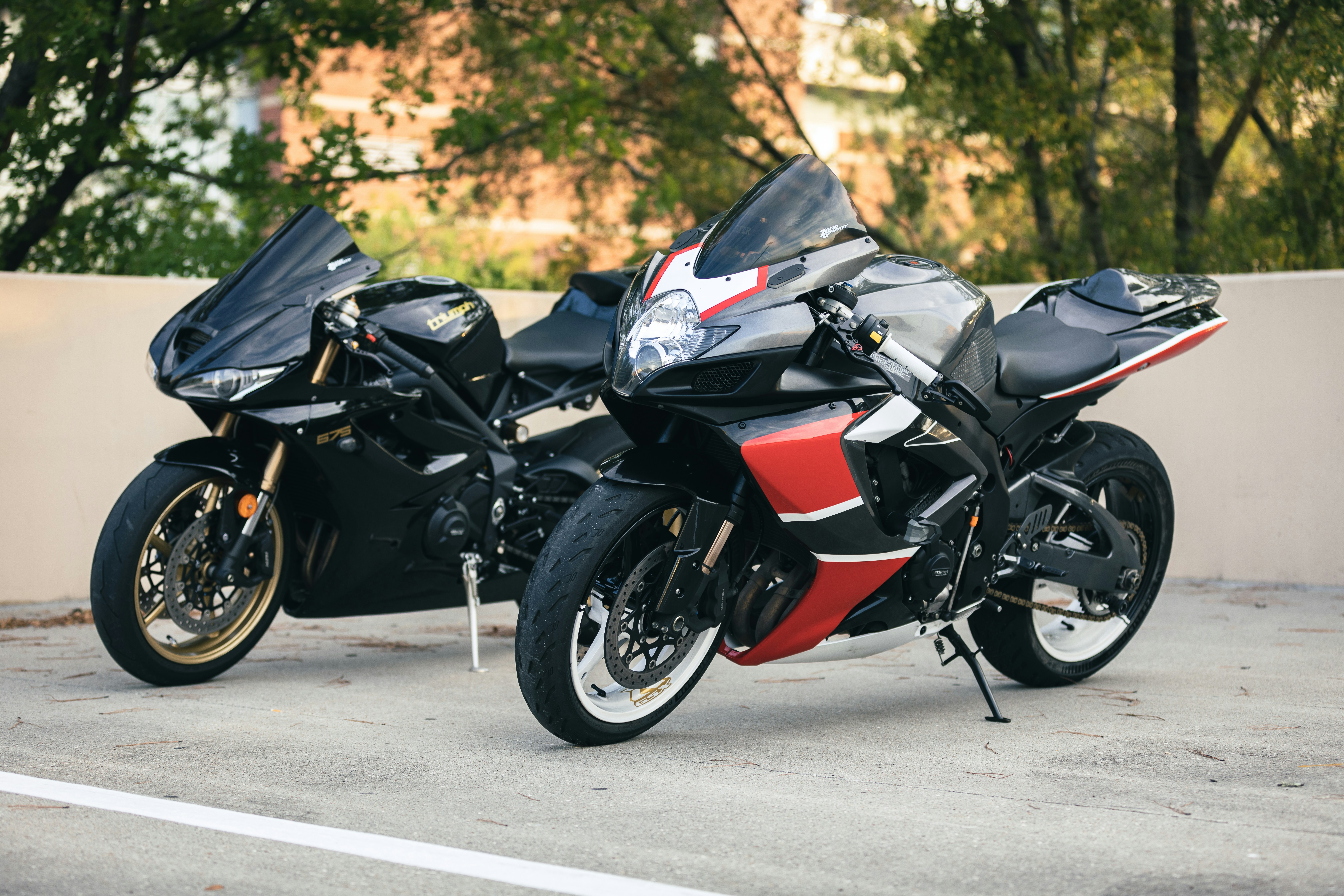 A side-by-side comparison of a new and used Ninja H2 motorcycle