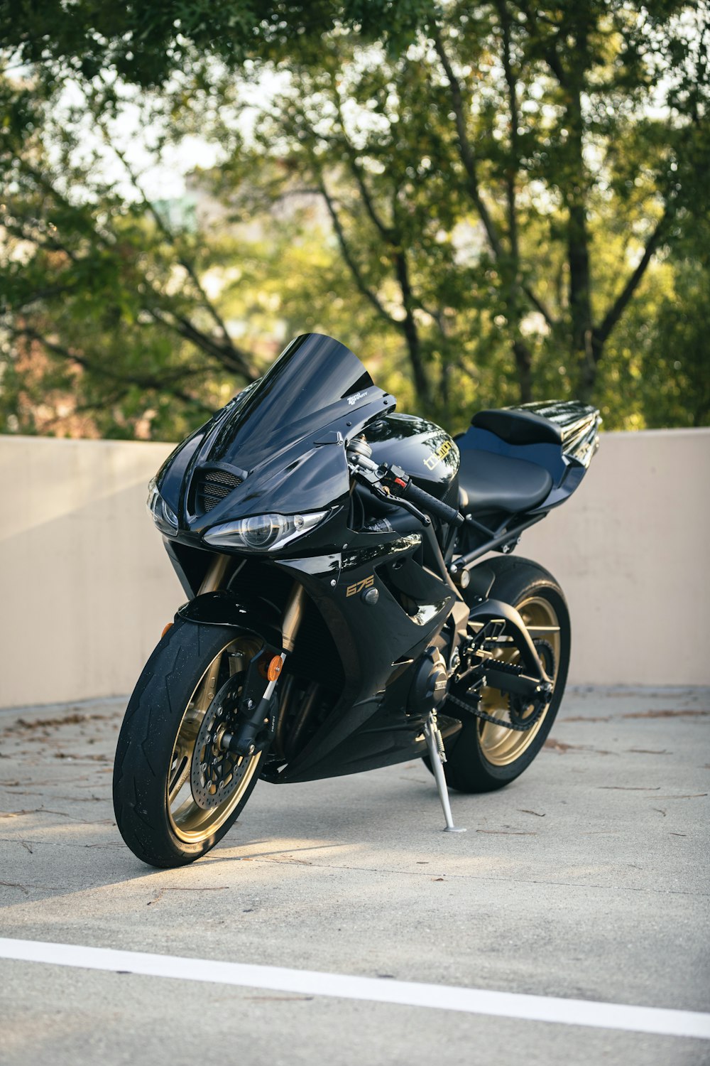 a black motorcycle parked on a street