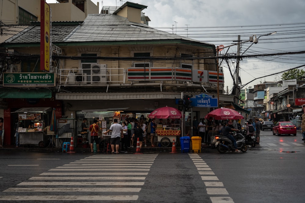 a busy street with people and shops