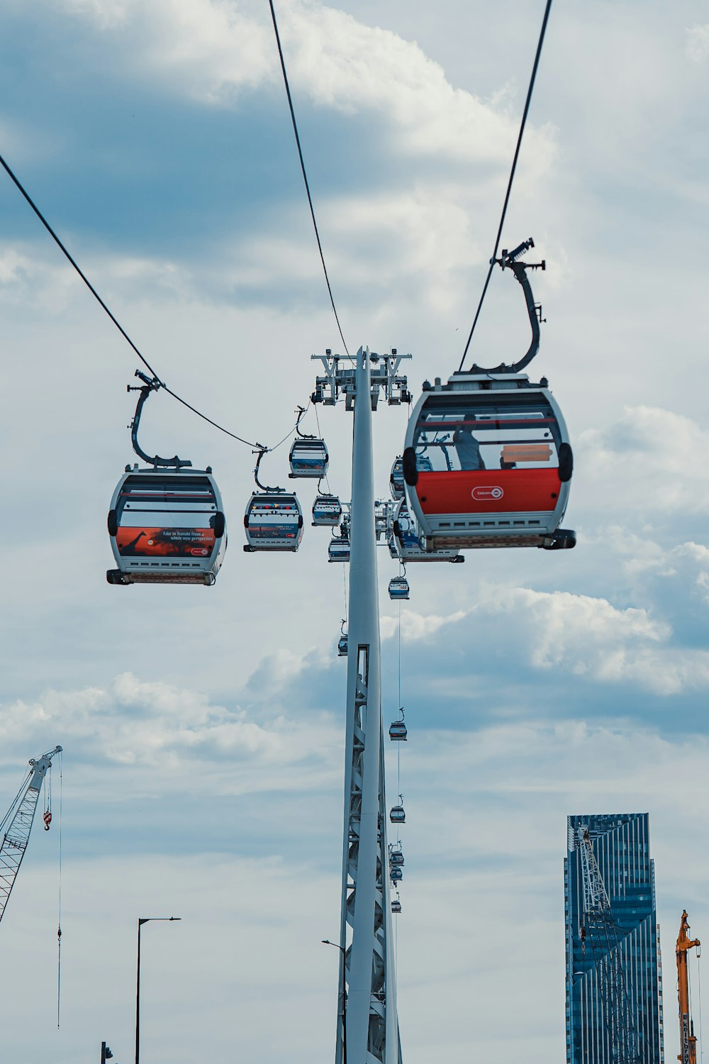 a group of cars on a cable