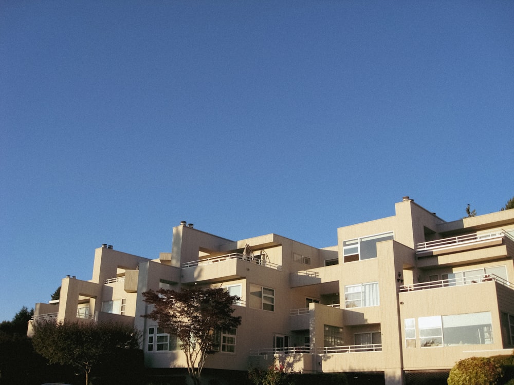 a building with trees in the front