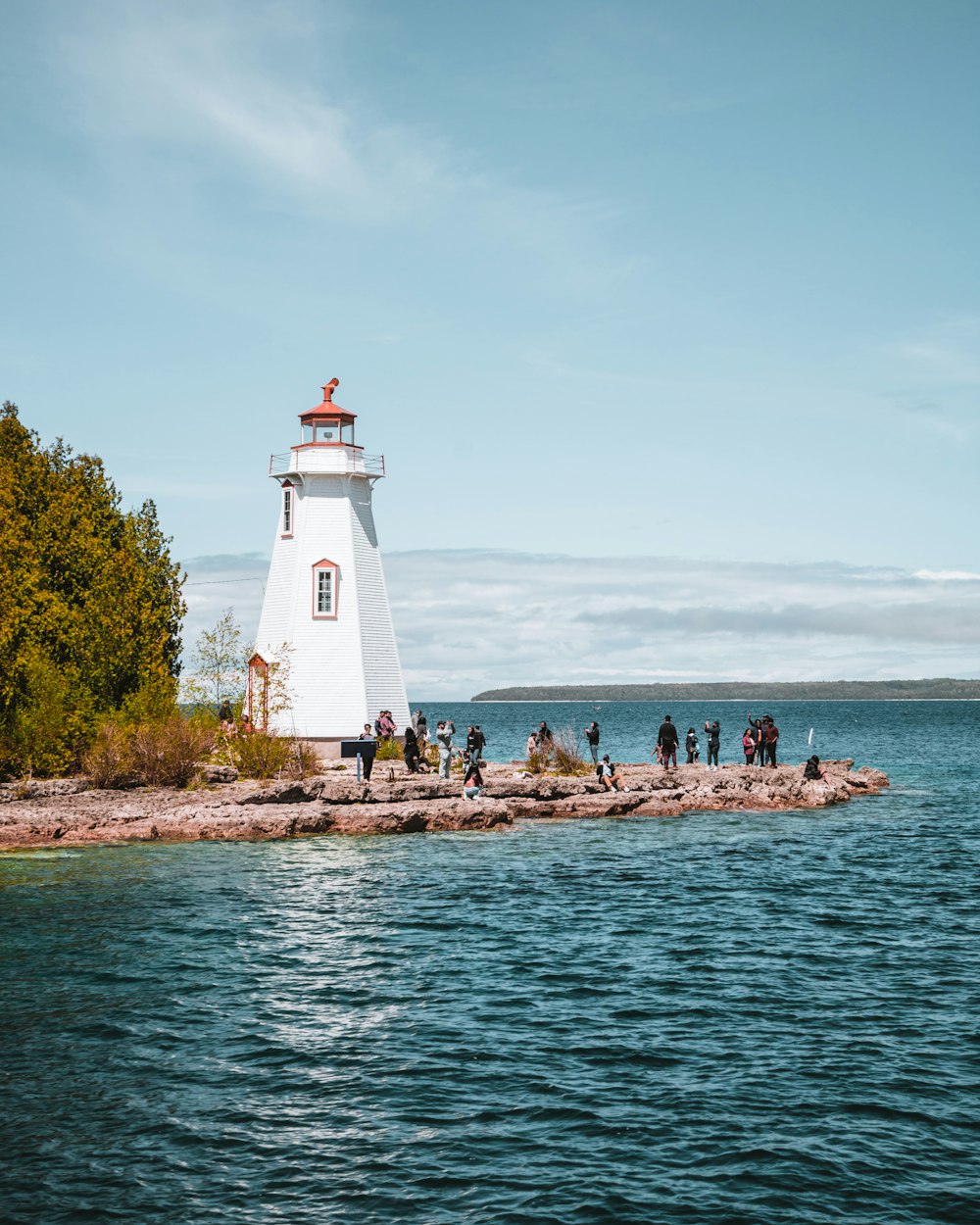 a lighthouse on a rocky shore