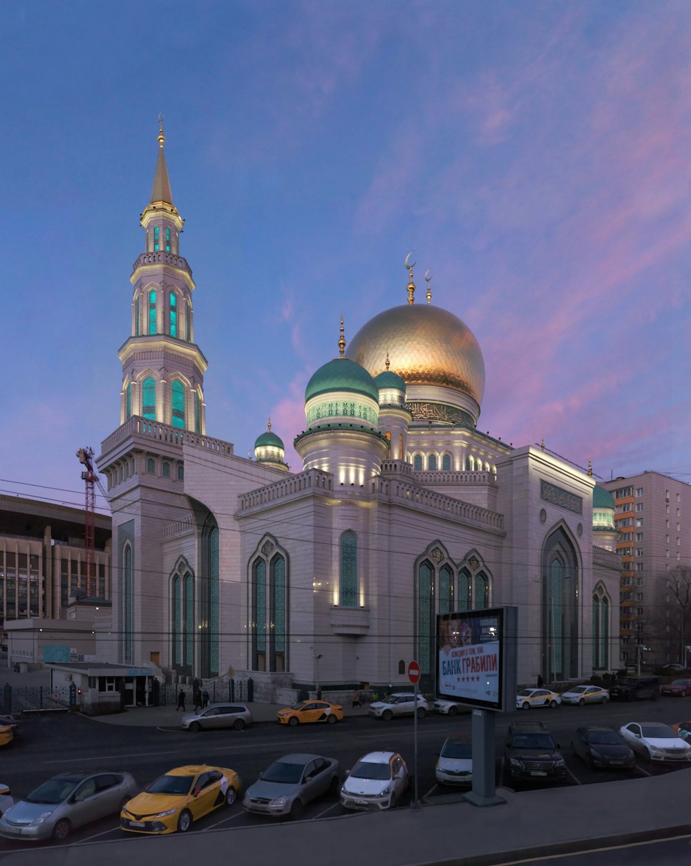 a large building with a dome and towers