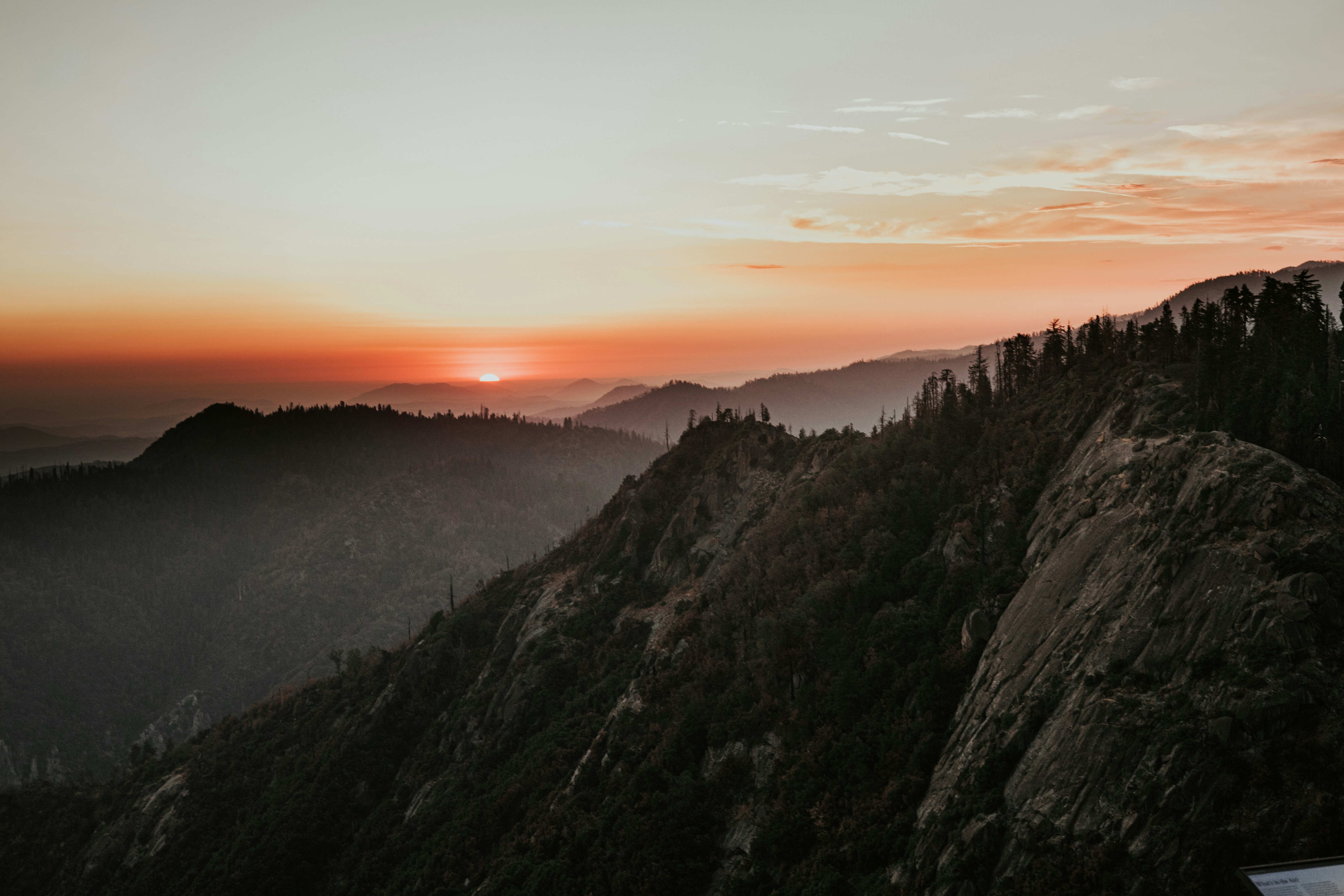 A mountain with a sunset in the background photo – Free Black Image on ...