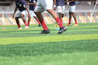 a group of men playing football