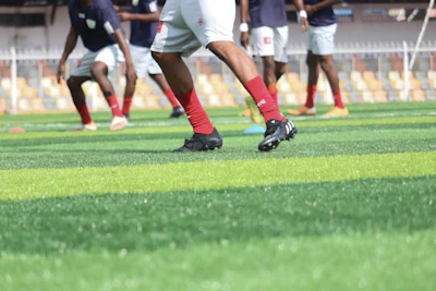 a group of men playing football