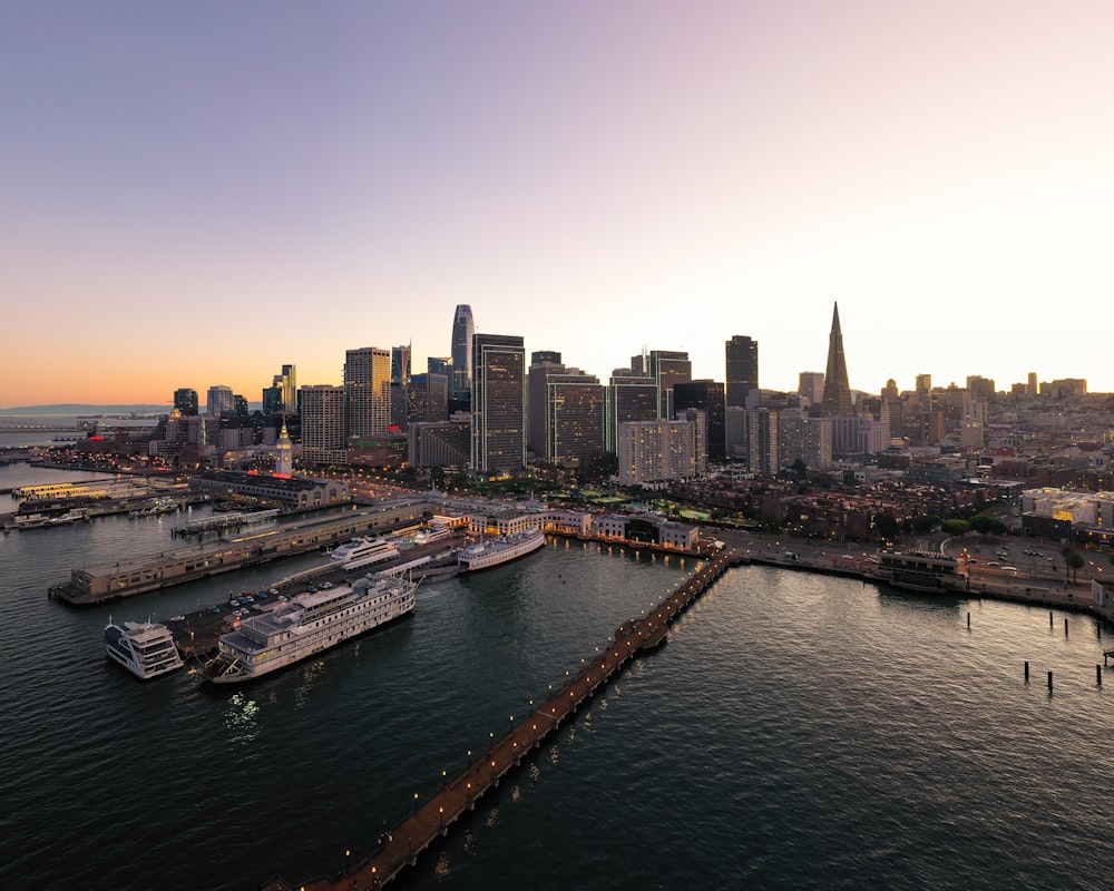 a city skyline with a river