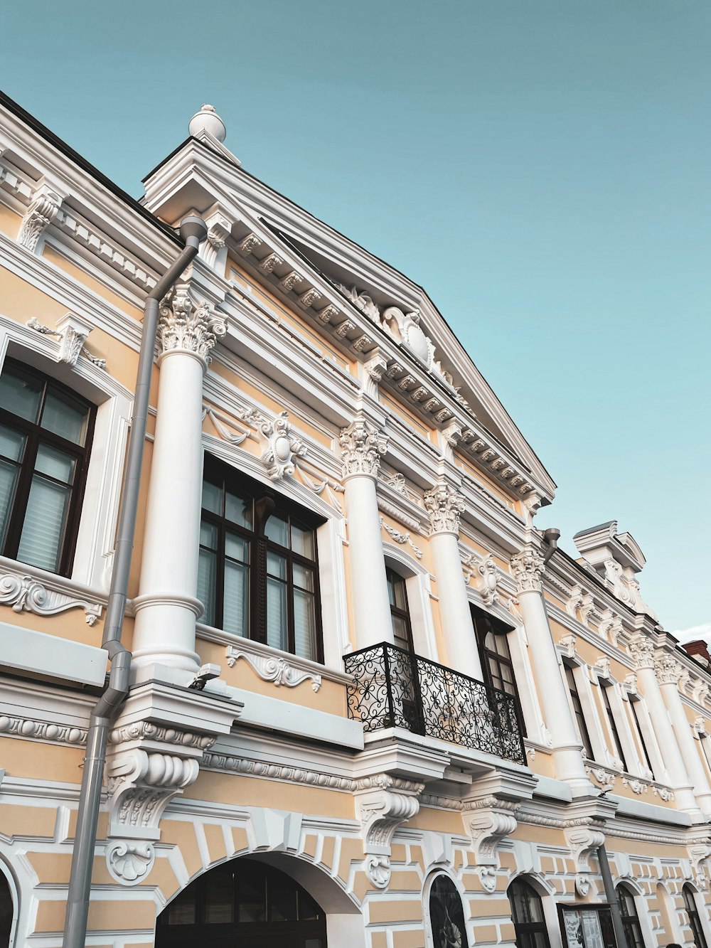 a building with columns and a balcony