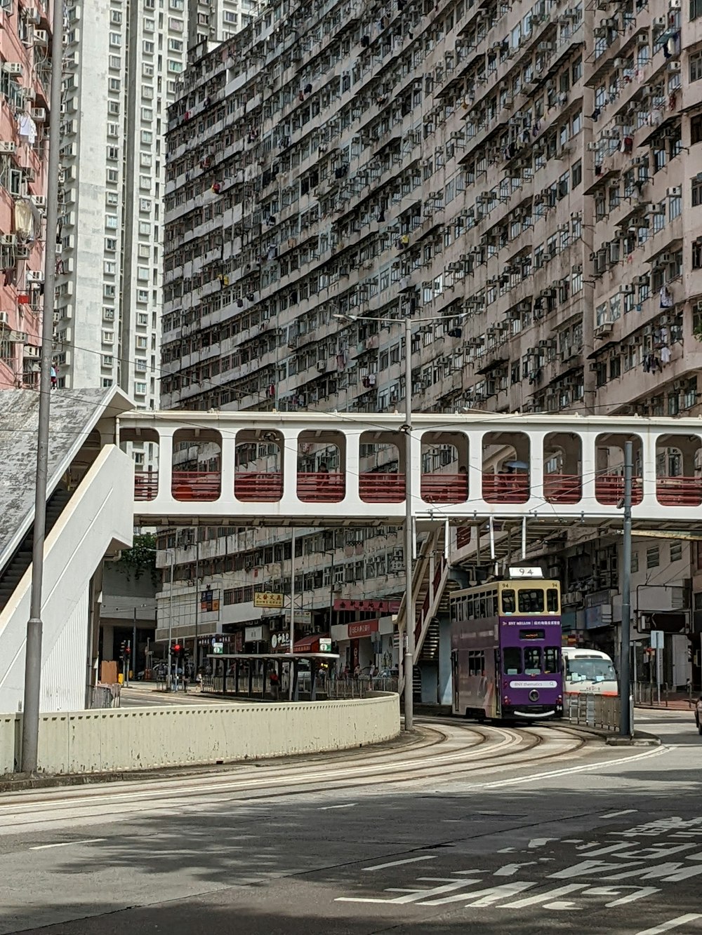 a bus travels down the street