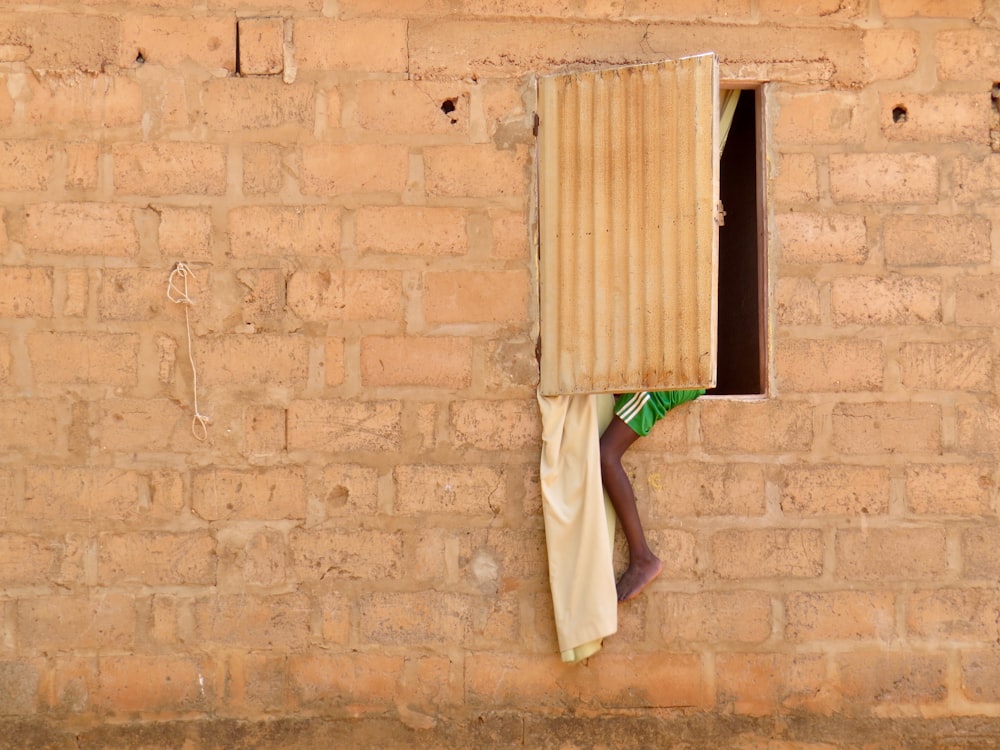 a person climbing a wall