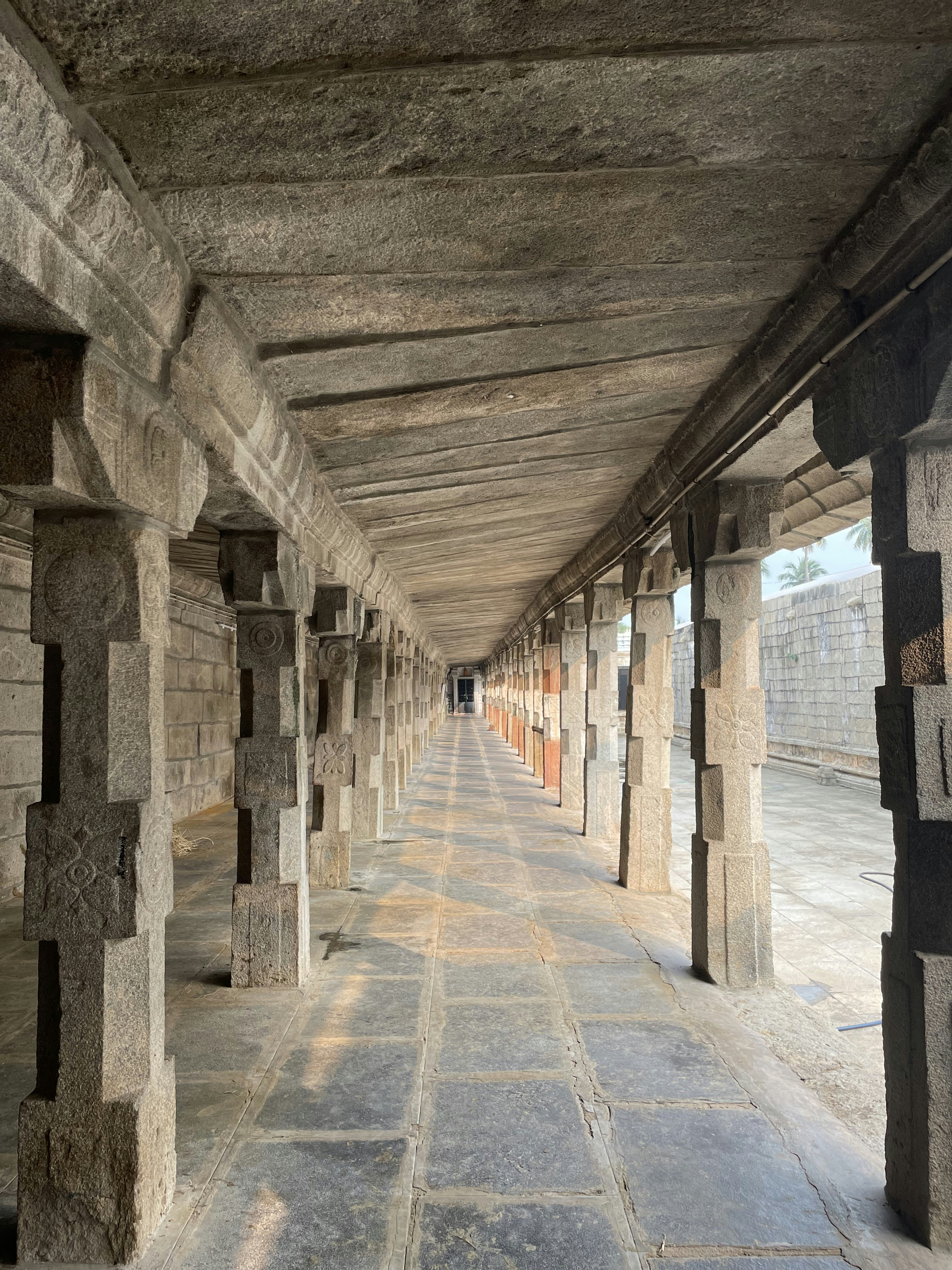 a long hallway with columns