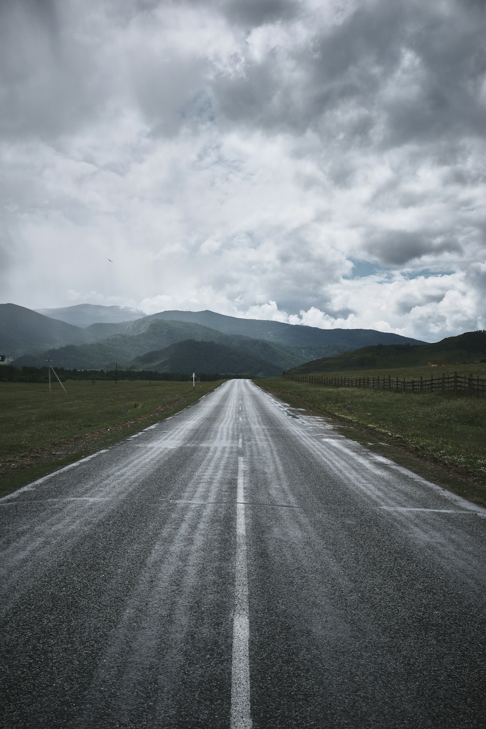 a road with grass on the side