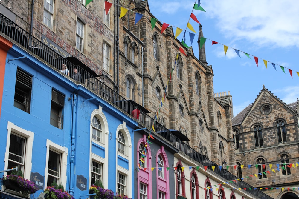 a building with flags on the roof