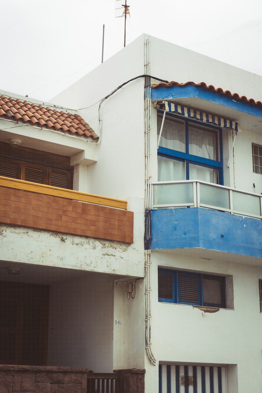 a building with a blue roof