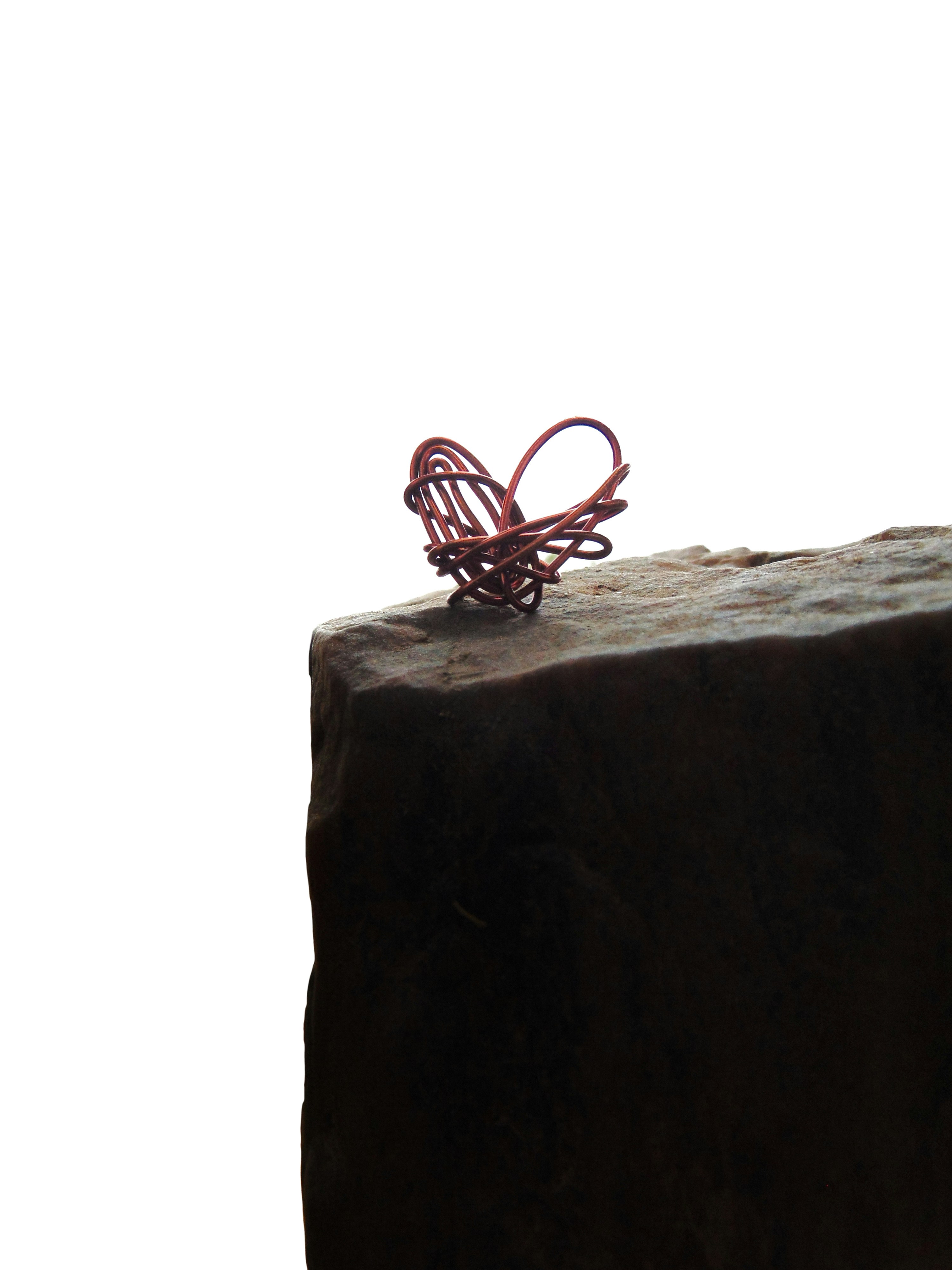 a pair of glasses on a rock