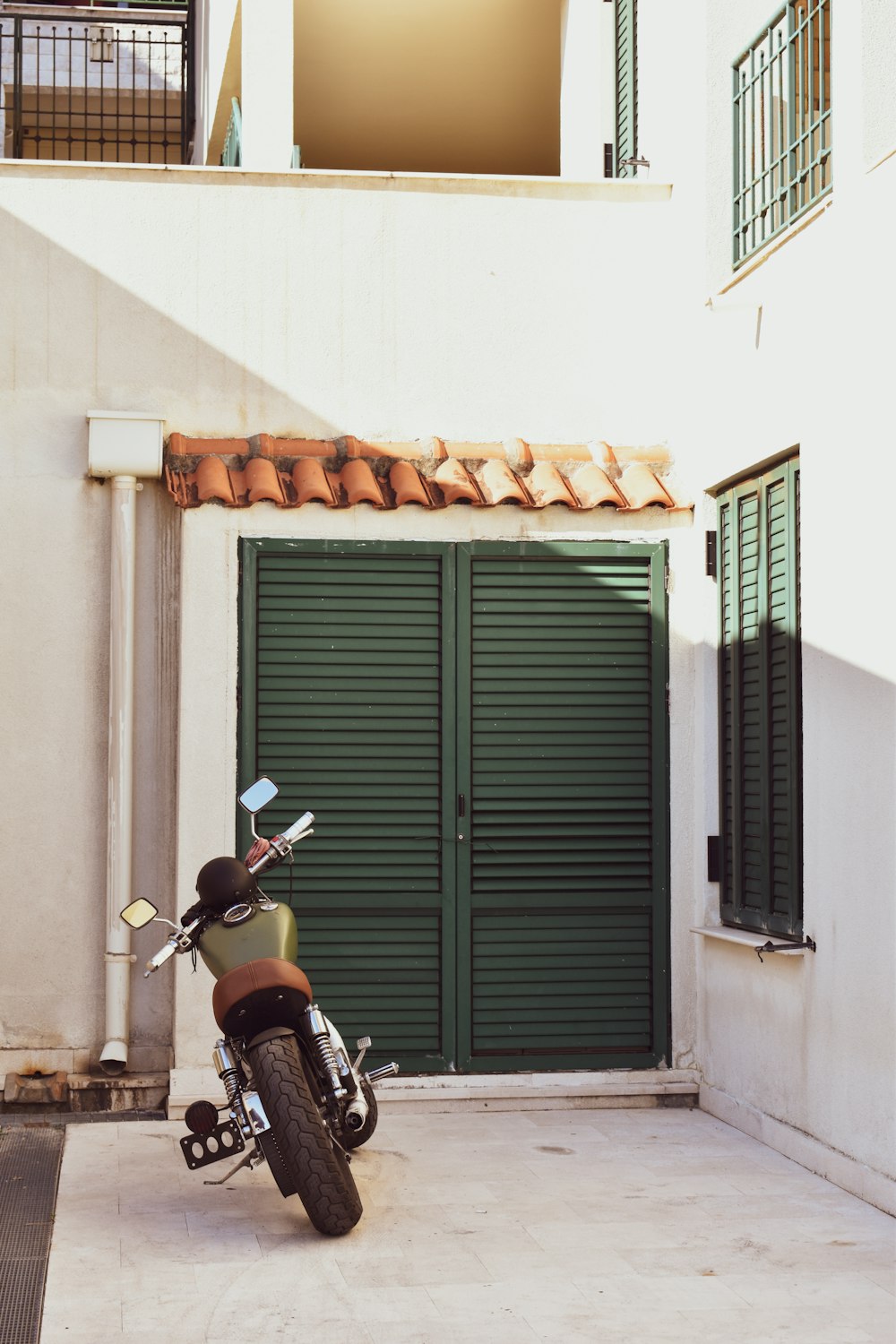 a motorcycle parked in front of a building