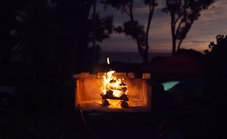 a fire pit with a flame