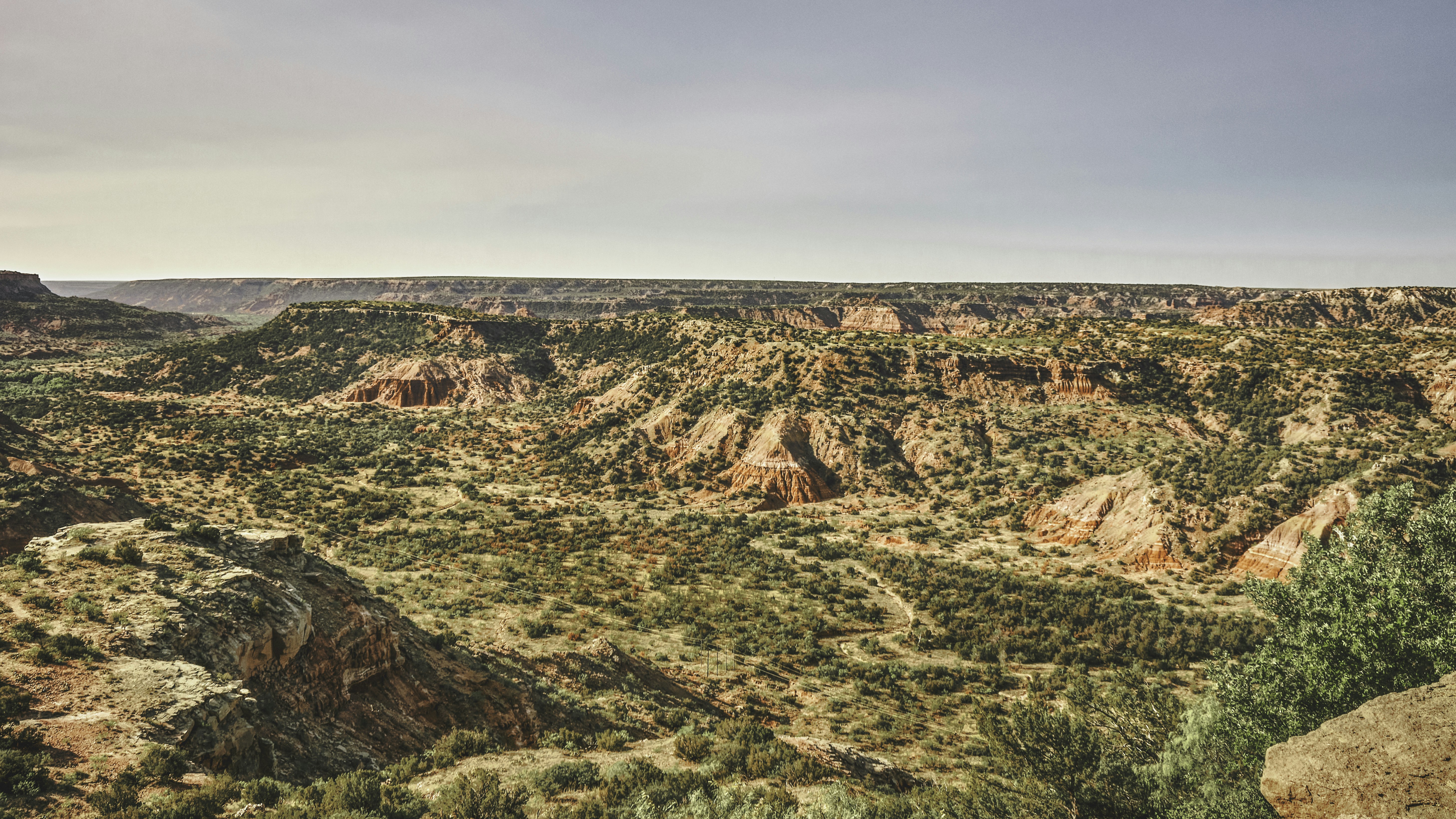 a landscape with hills and trees