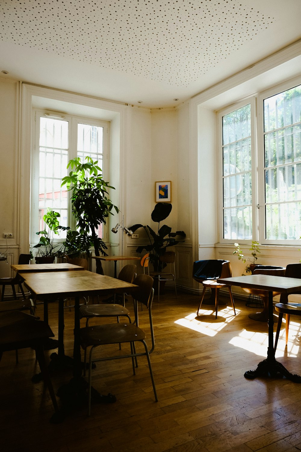 a room with tables and chairs